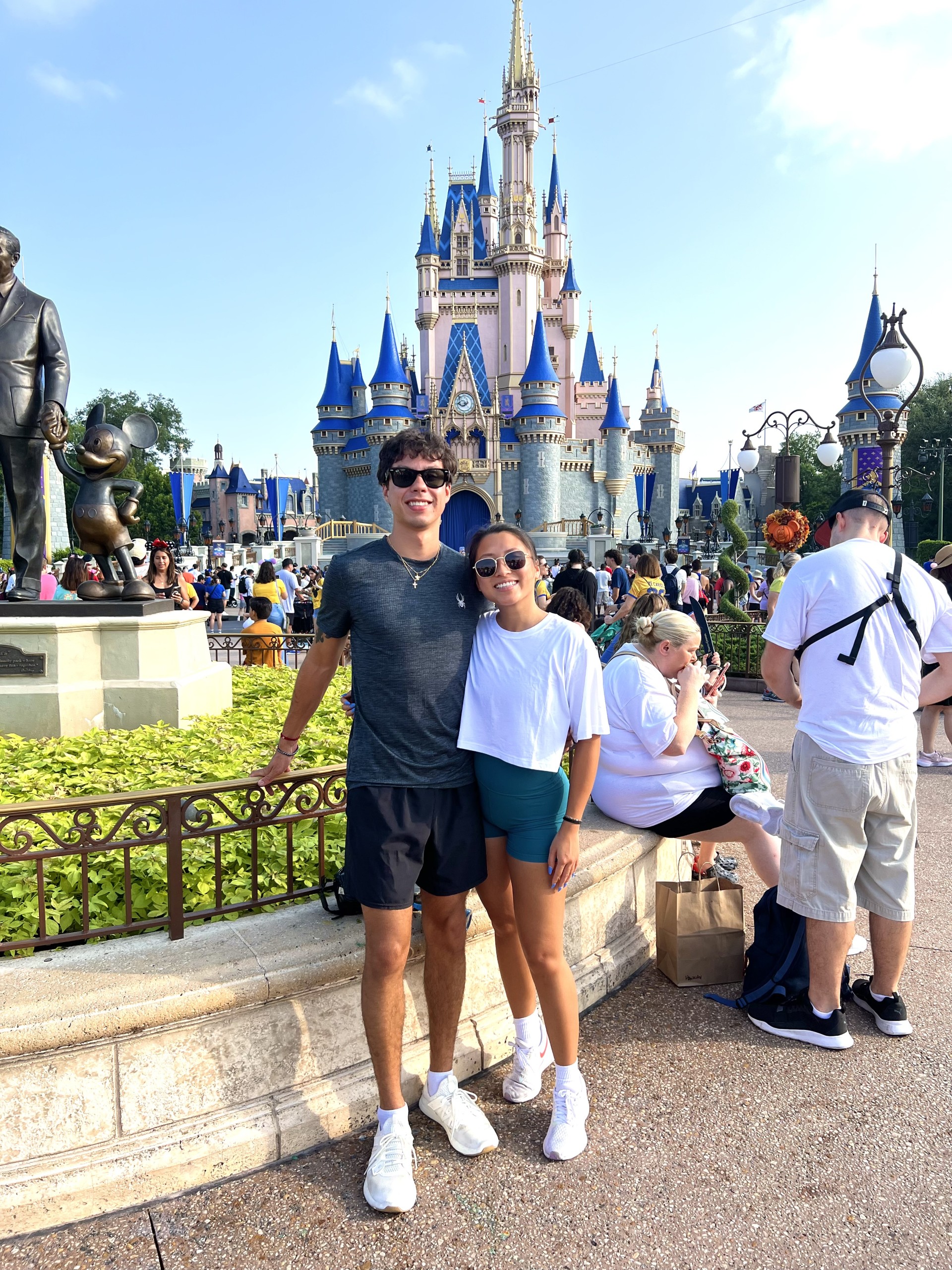 Emily and Matthew at Disney World in front of Cinderella Castle